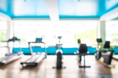 Özet olarak, arka plan için fitness ekipmanlarıyla iç mekan.