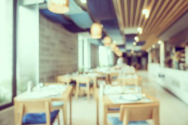 Arka plan için soyut bulanık kahve dükkanı ve restoran iç mekanı