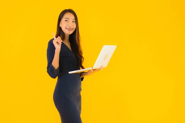 Portrait Beautiful Young Asian Woman Laptop Computer Yellow Isolated Background — Stock Photo, Image