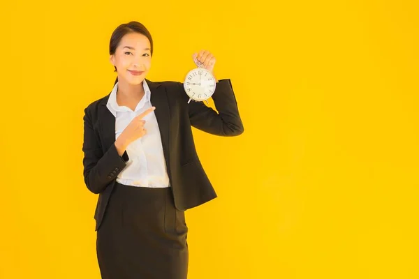 Portrait Beautiful Young Asian Woman Show Time Clock Alarm Yellow — Stock Photo, Image