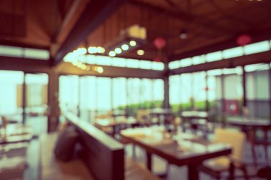 Arka plan için soyut bulanık restoran ve kafenin içi