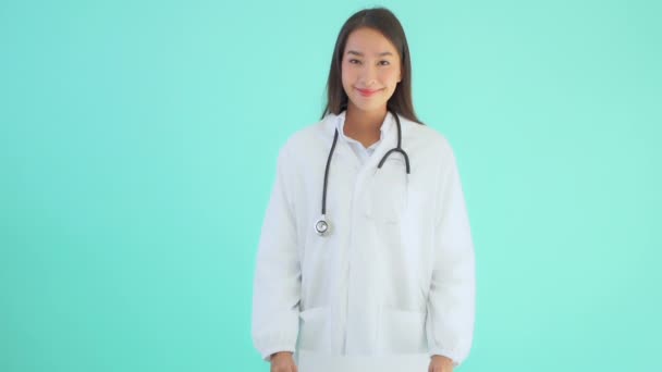 Footage Beautiful Asian Female Doctor Isolated Turquoise — Stock Video