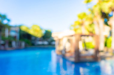 Seyahat ve tatil geçmişi için otel tatil beldesinde soyut bulanıklık ve açık yüzme havuzu