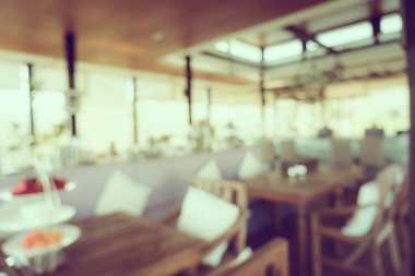 Arka plan için soyut bulanıklık ve kahve dükkanı ve restoran iç mekanı.