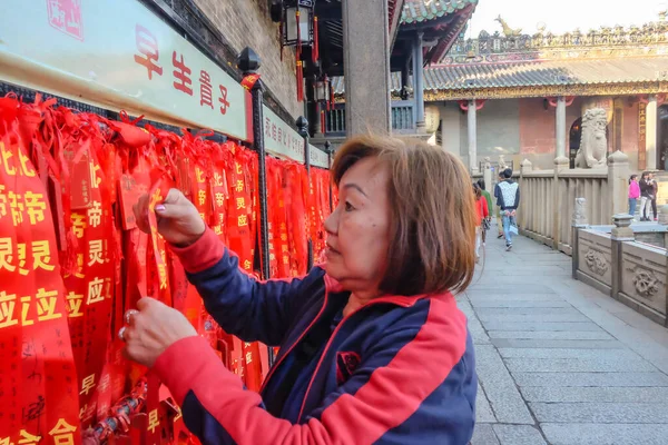 Foshan/China - 27 November 2015:Colorful Red Blessing ribbon,Wish and message in Foshan Ancestral Temple or \