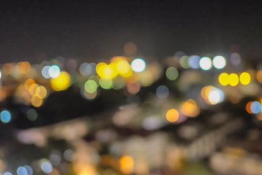 Wat saket Tapınağı 'ndaki Altın Dağ' dan Güzel Gece Şehir Manzarası 'nın soyut bulanık fotoğrafı ve 