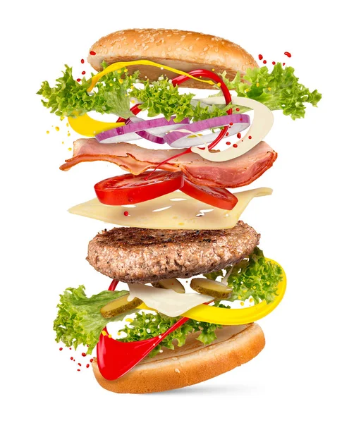 Hamburger Cheeseburger Concept Explozie Ingrediente Zburătoare Izolate Fundal Alb — Fotografie, imagine de stoc