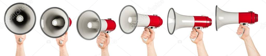 hand with red white bullhorn megaphone set 