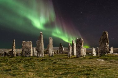 The Callanish Stones are an arrangement of standing stones placed in a cruciform pattern with a central stone circle. They were erected in the late Neolithic era, and were a focus for ritual activity during the Bronze Age.  clipart