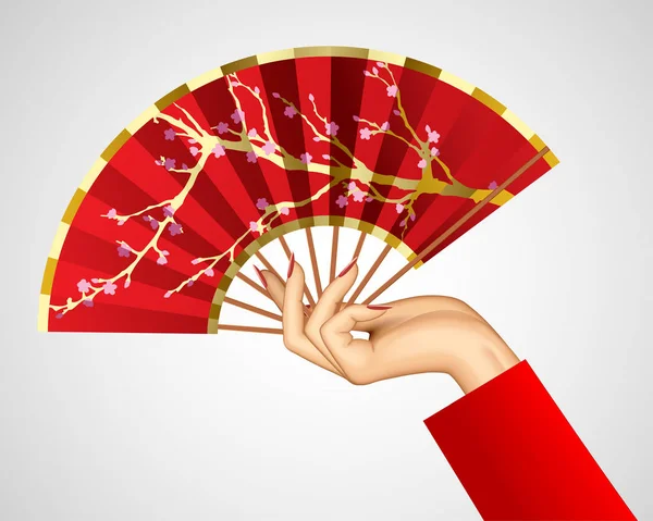 Mano de mujer con abanico rojo chino abierto aislado en blanco — Vector de stock