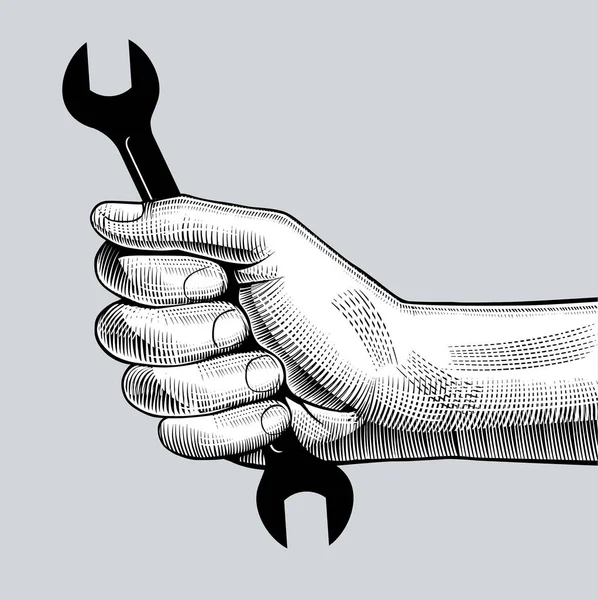 Man's hand holding wrench — Stock Vector