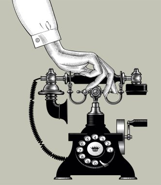 Kadın eli retro siyah telefon ile