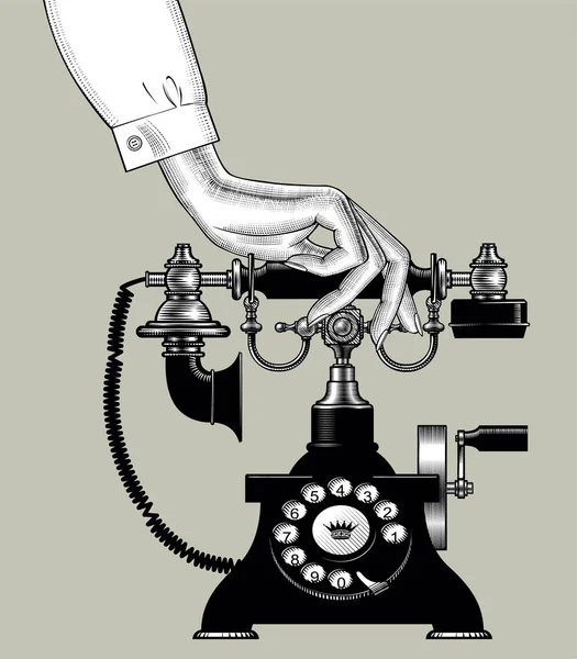 Rękę z retro czarny telefon — Wektor stockowy