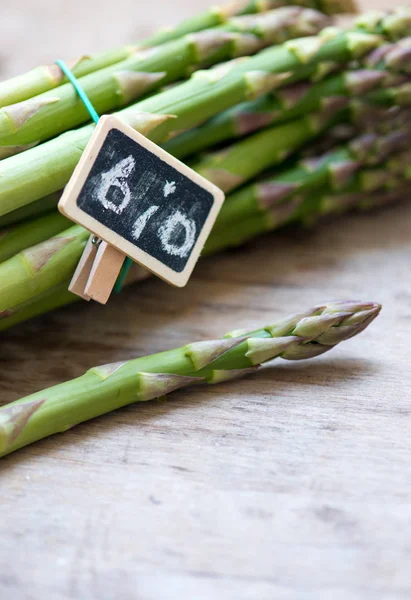Asparagus bio close up on a wooden background — Stock Photo, Image