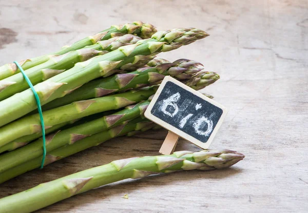 Asparagus bio close up on a wooden background — Stock Photo, Image