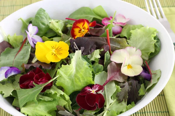 Edible flowers in fresh salad