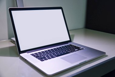 Laptop closeup on glass table
