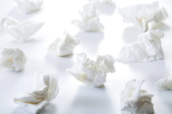 A pile of napkins used by cold patients