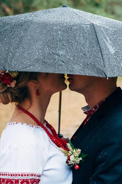 wedding photo shoot in the rain