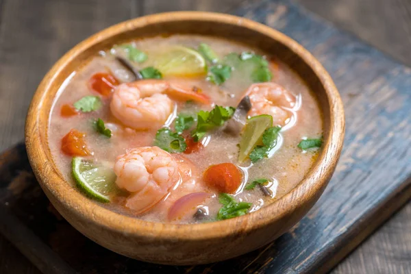 Tom yam kong or Tom yum, Tom yam is a spicy clear soup typical in Thailand