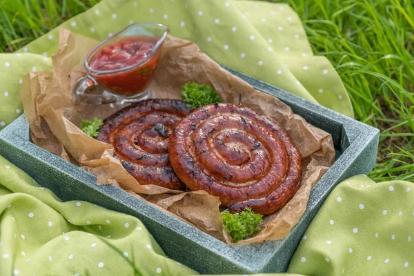 Grilled spiral sausages — Stock Photo, Image