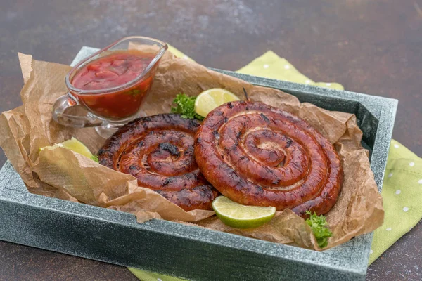 Grilled spiral sausages — Stock Photo, Image