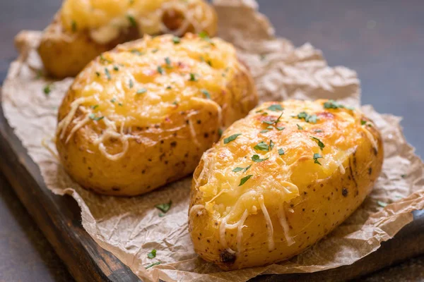 Baked stuffed potatoes with cheese and bacon — Stock Photo, Image
