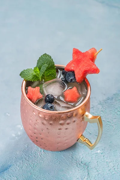 Patriotic Moscow Mule cocktail with watermelon and blueberry — Stock Photo, Image
