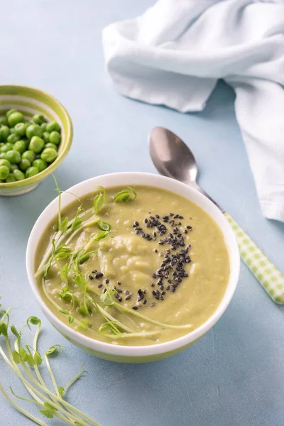 Green pea soup in bowl — Stock Photo, Image