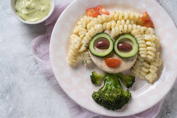 Funny Girl Food Face with Cutlet, Pasta and Vegetables