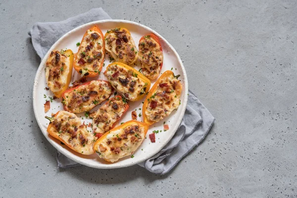 Peppers stuffed with cheese, bacon and herbs — Stock Photo, Image