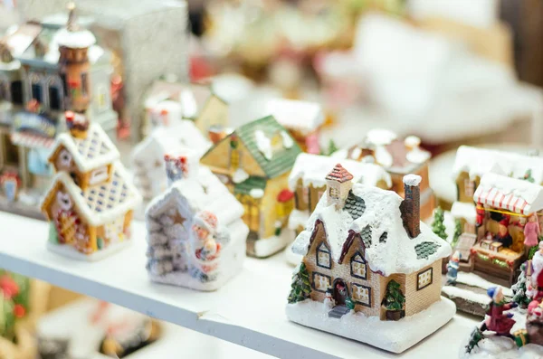 Christmas decorations. Cute winter houses. Winter holidays