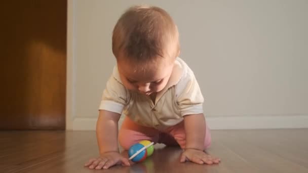 Cute Infant Girl Playing Toy Floor — Stock Video
