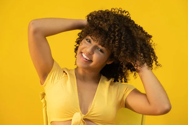 Young Latin Curly Woman Posing Bright Yellow Background — Stock Photo, Image