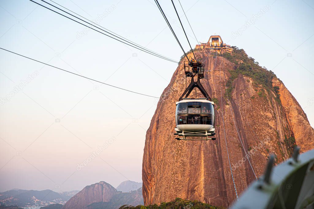 Rio de Janeiro, Rio de Janeiro / Brazil - Circa October 2019: Cable car at Sugar Loaf Mountain, view of Rio cityscape and Sugarloaf Cable Car.