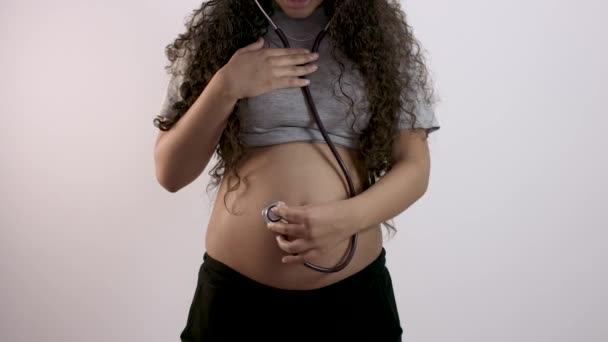 Pregnant Woman Checking Belly Stethoscope — Stock Video