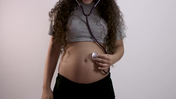 Pregnant Woman Checking Belly Stethoscope — Stock Video