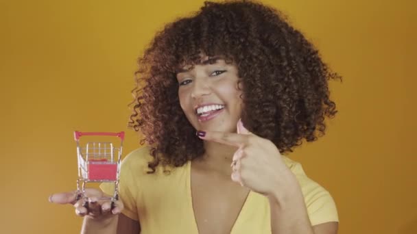 Young Brazil Curly Woman Gesturing Posing Yellow Background — Stock Video