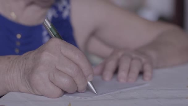 Close View Old Woman Writing Notes — Stockvideo