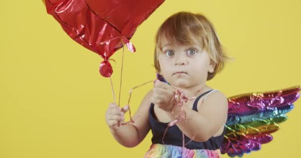 Cute Girl Angel Wings Posing Yellow Background — Stock Video