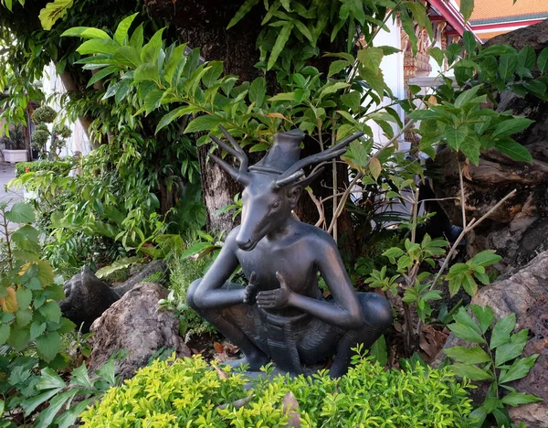 Metal Park Sculpture Depicting Seated Man Deer Mask — Stock Photo, Image