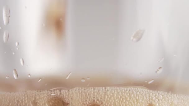 Dark Carbonated Drink Poured Glass Cup Close Foam Rises Bubbles — Stock Video