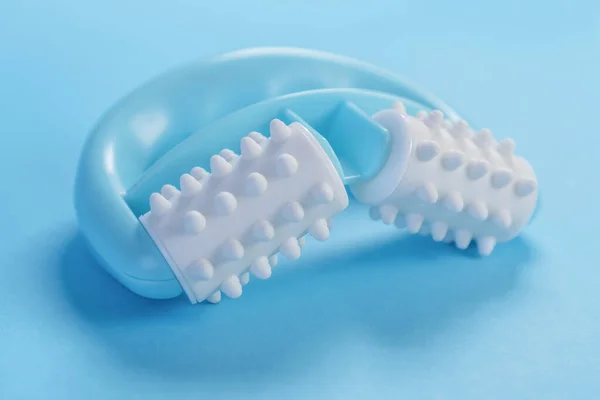 Turquoise Plastic Massager White Soft Rollers Pimples Blue Creative Background — Stock Photo, Image