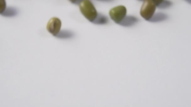 Mung Bean Fills White Plate Slow Motion Macro — Stock Video