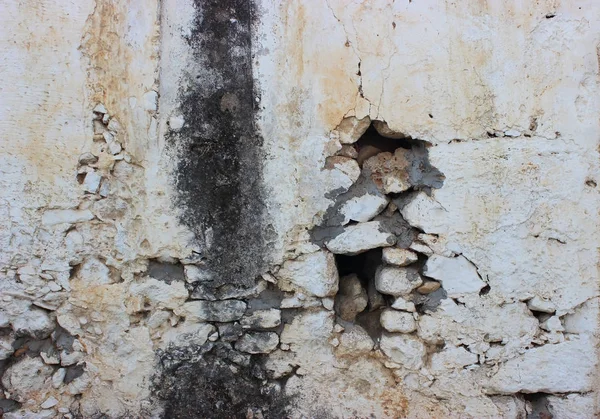 Antiguo muro enlucido en ruinas de un edificio — Foto de Stock