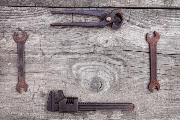 Rusty wrenches and old tools