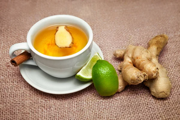 Cup with ginger tea with ginger and lime — Stock Photo, Image