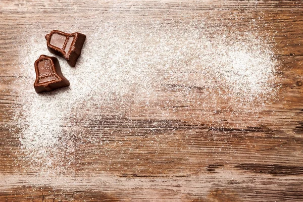 Cioccolato caramelle di Natale con forma di una piccola campana — Foto Stock