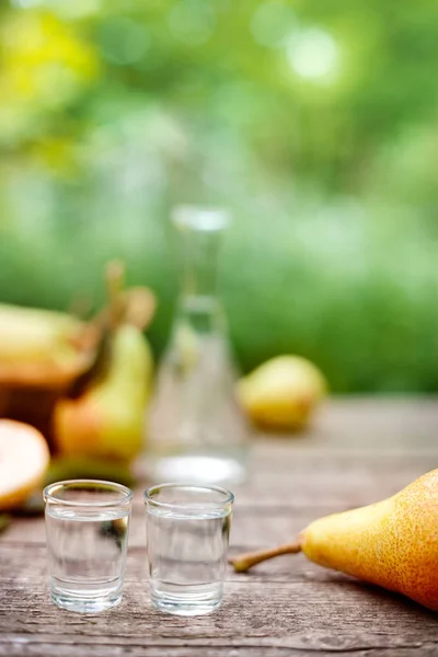 Pear liqueur in shot glass — Stock Photo, Image