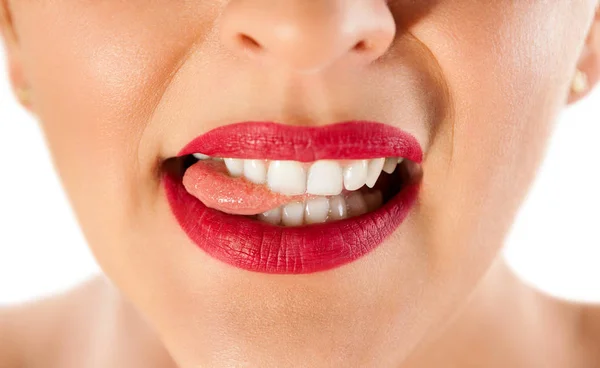 Seductive lips biting tongue — Stock Photo, Image